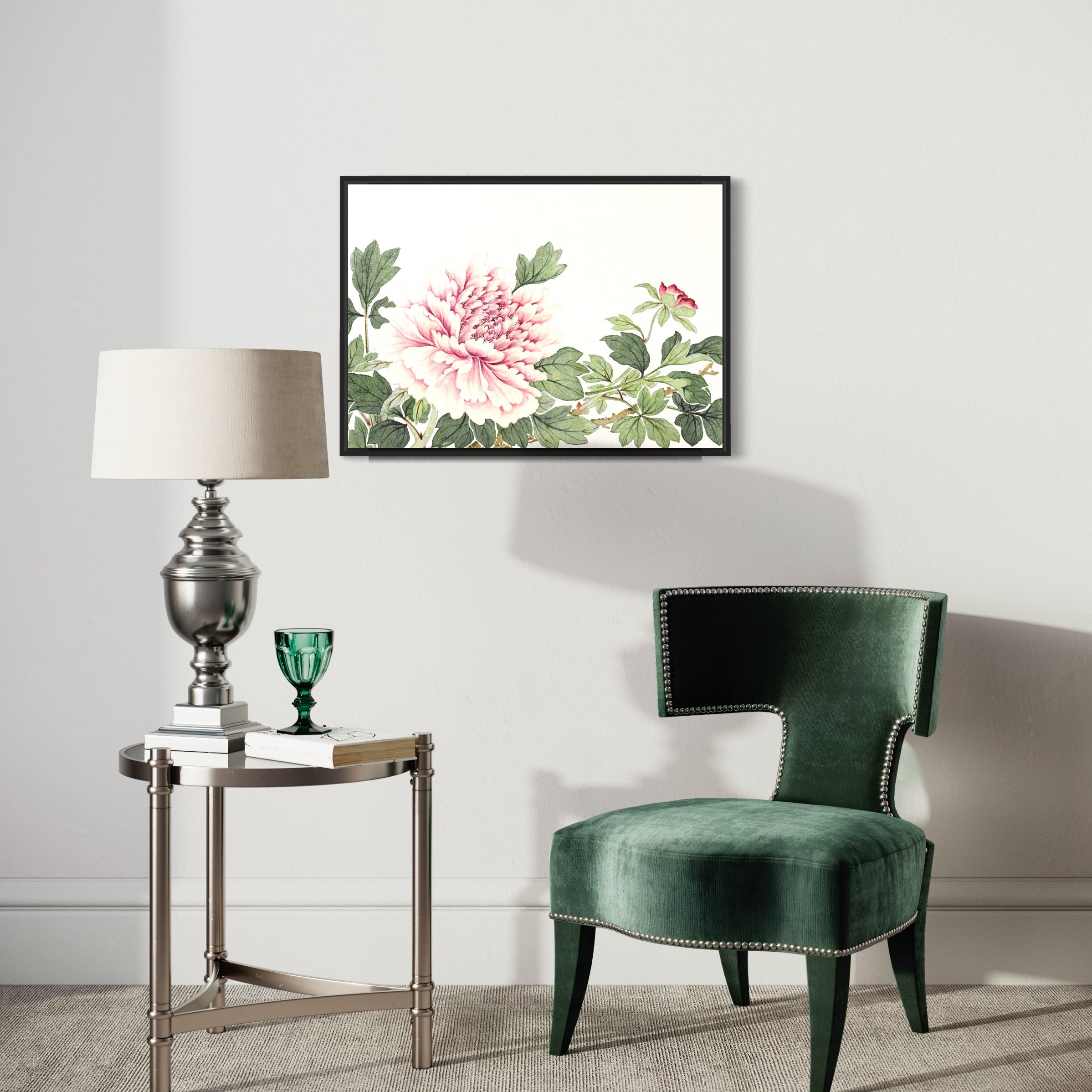Elegant living room with green velvet chair, floral wall art, metallic side table and lamp