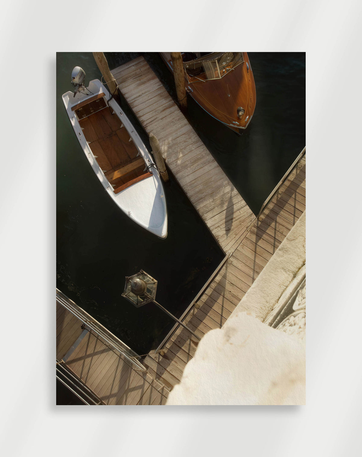 Boats wooden dock poster with an aerial view of a white boat and a wooden boat docked at a pier