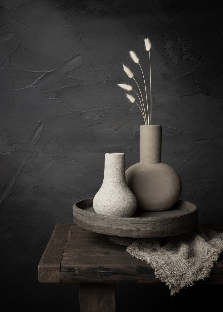 Ceramic vases poster with two ceramic vases and dried pampas grass on a wooden table