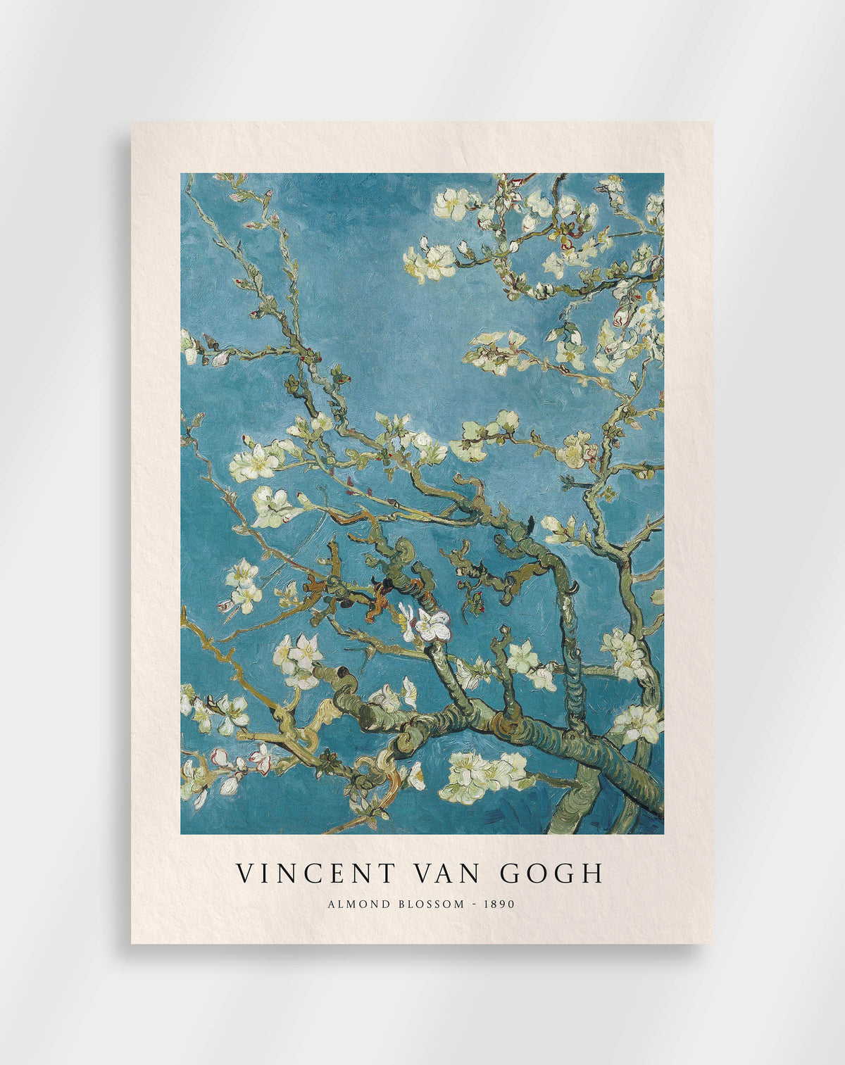A poster of Vincent van Gogh's Almond Blossom painting, featuring a vibrant blue background with golden almond blossoms and a bird perched among the branches.